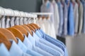 Rack with clean clothes on hangers after dry-cleaning Royalty Free Stock Photo