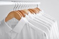 Rack with clean clothes on hangers after Royalty Free Stock Photo