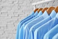 Rack with clean clothes on hangers after Royalty Free Stock Photo