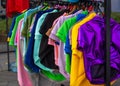 Rack of colorful clothes for dogs in a pet shop, animal fashion Royalty Free Stock Photo