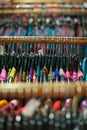 A rack of colorful shirts hanged for sale at a fair Royalty Free Stock Photo