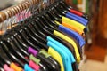 A rack of colorful shirts hanged for sale at a fair Royalty Free Stock Photo