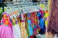 A rack of colorful shirts hanged for sale at a fair Royalty Free Stock Photo