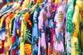 A rack of colorful shirts hanged for sale at local market Royalty Free Stock Photo