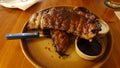 A rack of delicious baby back ribs with barbecue sauce, french fries, coleslaw and beer Royalty Free Stock Photo