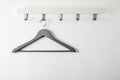 Rack with empty clothes hanger. Wardrobe accessory Royalty Free Stock Photo