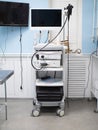 Rack of endoscopic equipment for gastroscopy. In an empty room, stand a device for gastroscopic examination of the Royalty Free Stock Photo