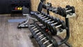 rack full of dumbbells in a commercial gymnasium