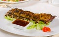 Rack of Grilled Pork Ribs on Plate Royalty Free Stock Photo