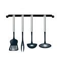 Rack of kitchen utensils isolated hanging