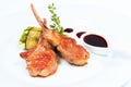 Rack of lamb with sauce and vegetables Royalty Free Stock Photo
