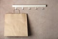 Rack with paper shopping bag Royalty Free Stock Photo