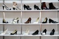 Rack of shoes in shop or department store Royalty Free Stock Photo