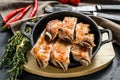 Rack of spicy barbecued chili spare ribs. Black background. Top view