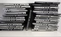 Rack with a stack of laptops in the storage room Royalty Free Stock Photo