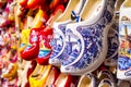 Rack in the store with rows traditional dutch wooden shoes - klompen