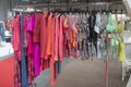 A rack with summer style dresses and bikinis at Momad 2023 Madrid Spain