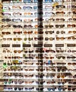 Rack with sunglasses in eyewear store. Galeries Lafayette Royalty Free Stock Photo