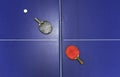 Rackets on a ping pong table