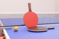 Rackets for table tennis, ping pong and a ball on the table. Royalty Free Stock Photo