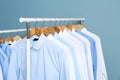 Racks with clean clothes after dry-cleaning Royalty Free Stock Photo