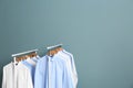 Racks with clean clothes after dry-cleaning Royalty Free Stock Photo