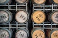 Racks of new and old oak barrels used for wine maturation