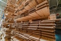 racks with a parquet board are in the warehouse of factory. Manufacturing of a parquet board. Royalty Free Stock Photo