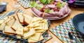 Raclette cheese and meat, french tradition