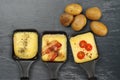 Raclette trays and potatoes