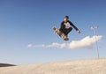 A rad day at the skate park. A young man doing tricks on his skateboard at the skate park. Royalty Free Stock Photo