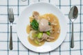 Rad Na, Famous Thai Chinese style wide rice noodle dish with tasty tender pork with thick gravy sauce. Flat lay with spoon and for