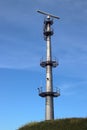 Radar antenna on tall mast at the port of rotterdam to guide ships