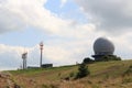 Radar dome on mountain Wasserkuppe with glider (sailplane) in RhÃ¶n Mountains, Germany