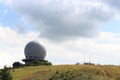 Radar dome on mountain Wasserkuppe with glider (sailplane) in RhÃ¶n Mountains, Germany