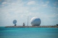 Radar dome technology on the sea coast Royalty Free Stock Photo