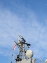 Radar system of a warship. Militarism. Ship electronics. tower against the sky Royalty Free Stock Photo