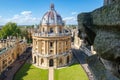 The Radcliffe Camera and a gargoyle from the Church of St Mary at Oxford