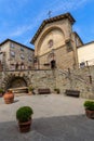 Radda in Chianti, Siena, Tuscany, Italy: the ancient church Propositura di San Niccolo and the old fountain in the Tuscan medieval Royalty Free Stock Photo