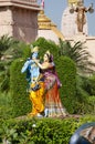 Radha and Krishna playing the flute in garden of Nilkanthdham, Swaminarayan temple, Poicha