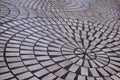 Radial pattern of bricks laid on the ground