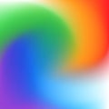 Radial rainbow gradient background. Blurred vortex bright abstract wallpaper. Liquid flowing vibrant mesh texture