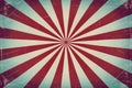 Radial red and beige stripes create starburst pattern with nostalgic vintage texture