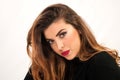 Radiant Beauty: Mesmerizing Close-Up of a Young Woman in Studio on White Background