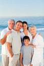 Radiant family at the beach Royalty Free Stock Photo