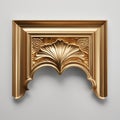 A gold object with a gold design on it is on a white wall.