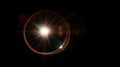 Radiant Lens Flare Over Black Background