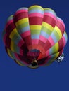 Radiant multicolored balloon glowing in the skies at the Albuquerque International Balloon Fiesta