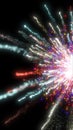 Radiant multicolored explosive firework-like burst with sparkling particles expanding in all directions Royalty Free Stock Photo