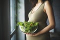 Radiant Pregnant smiling woman bowl salad. Generate Ai Royalty Free Stock Photo